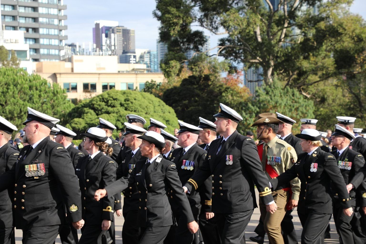 Uniformed servicemen and service women participating the ANZAC Day March