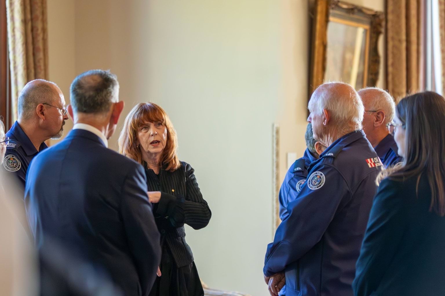 The Governor in discussion with guests at the reception.