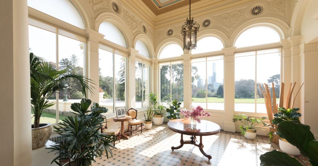 Conservatory looking out to the gardens and city skyline