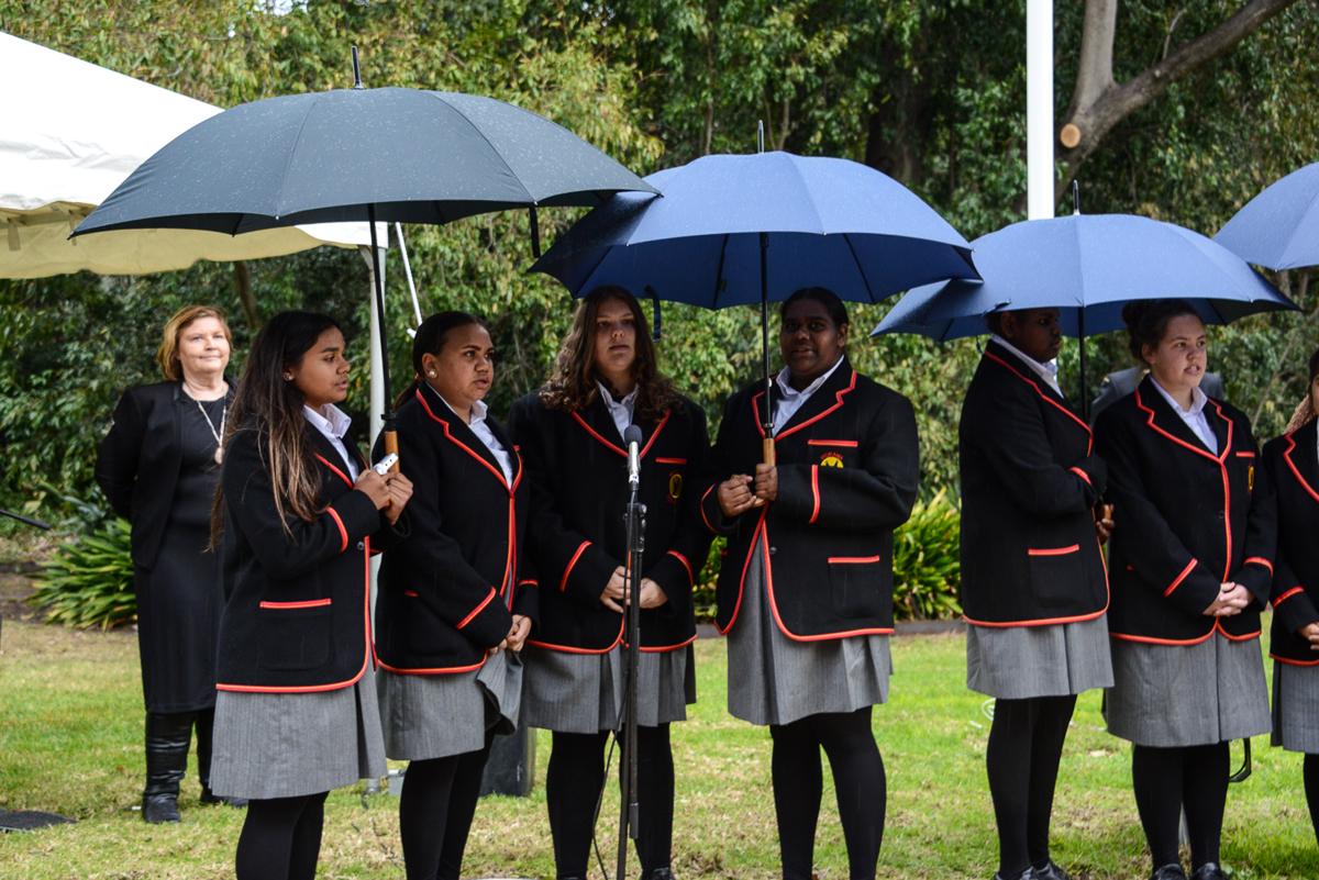 Worawa Aboriginal College students singing at the flag raising ceremony