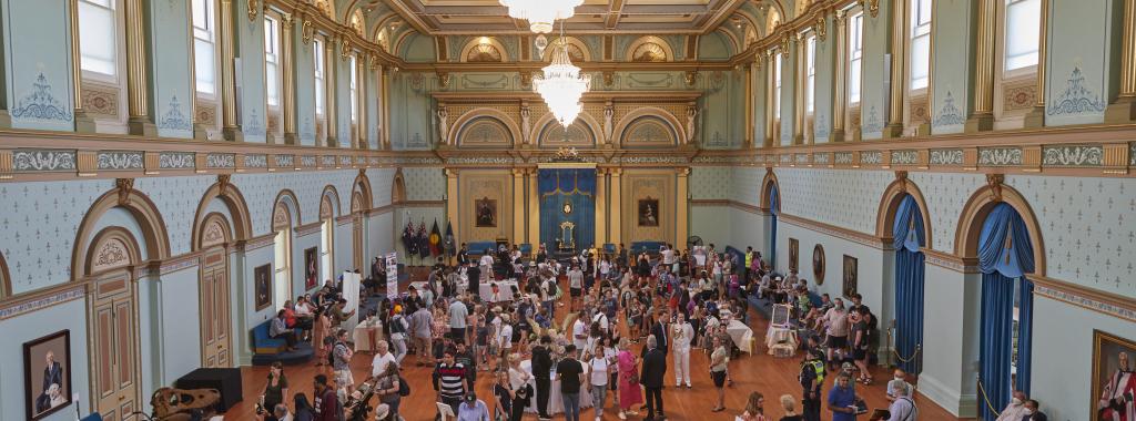 Visitors participating in activities in the Ballroom at the 2023 Open Day.